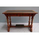 A Victorian Gothic revival chamber table, by Gillows of Lancaster,