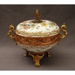 A 19th century porcelain and gilt metal mounted pot pourri bowl and cover, in the Meissen style,
