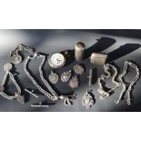 A silver vesta case together with a silver perfume bottle, silver watch chain, silver medallions,