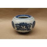 A Chinese blue and white porcelain water pot of compressed globular form,