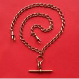 A 9ct gold double Albert watch chain with twisted oval links,46cm long, approximately 26.
