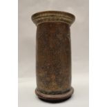 A Qajar engraved and pierced brass cylindrical vase, Persia,