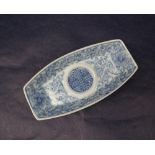 A Chinese blue and white porcelain teapot stand of rectangular form,