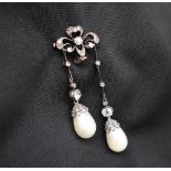 A late Victorian natural pearl and diamond negligee-style pendant brooch with an openwork trefoil