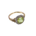 An 18ct yellow gold peridot and diamond ring head size 10 by 10mm, ring size H, 2.2g.