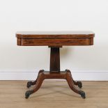 A GEORGE III SATINWOOD BANDED ROSEWOOD AND COROMANDEL FOLD OVER TEA TABLE