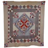 THREE VICTORIAN PRINTED COTTON PATCHWORK QUILTS AND ANOTHER (4)
