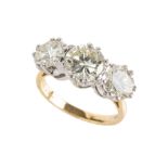 A THREE STONE DIAMOND RING (3)