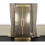 A PAIR OF GILT LACQUERED AND FAUX METAL VENEERED TWO DOOR CABINETS (2)