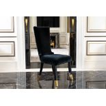 A SET OF TEN BLACK VELVET UPHOLSTERED HIGH BACK DINING CHAIRS (10)