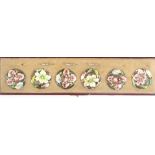 Buttons, silver and enamel, Japan, late 19th Century, a fine cased set of six, in silver relief