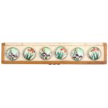 Buttons, silver and enamel, Japan, late 19th Century, a fine boxed set of six each in silver and gin