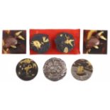 Buttons, shakudo, and a silver example, Japan, late 19th / early 20th Century, seven, comprising a