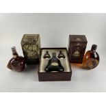 A boxed Cognac Hennessy three bottle set, a bottle of Chivas Royal Salute scotch whiskey and a