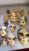 Set of 12 Venetian-style painted wall masks