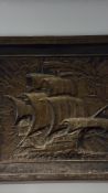 Framed embossed metal relief plaque depicting a sailing ship