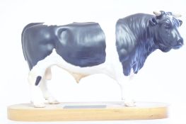 Beswick Connoisseur Friesian Bull figure on wood plinth