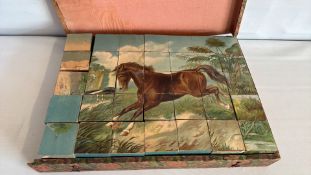 Antique wooden childrenâ€™s picture-cube puzzle in decorated box