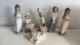 Set of six Lladro and NAO porcelain figurines