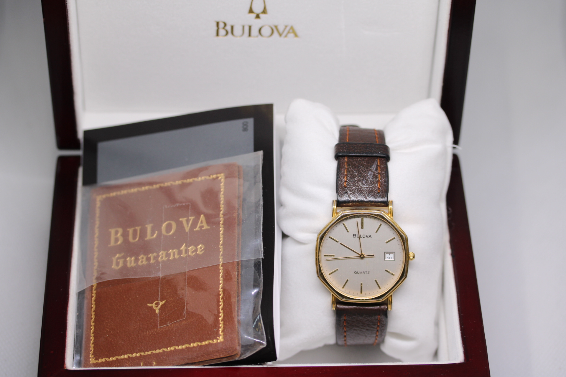 Bulova quartz watch with box, outer box & papers