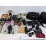 Photographic equipment and accessories to include: an Olympus OM-2 body, a RX49 Panasonic camcorder,
