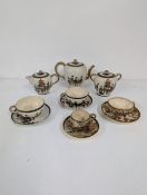 A Japanese Satsuma tea service to include a tea pot, milk jug, sugar bowl and two cups and