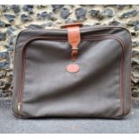 Mulberry- A vintage suitcase in mole Scotchgrain and tan saddle leather trim and handles with