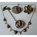 Georg Jensen- A 1950's silver oval brooch with floral and leaf design No:138, 10.4g, stamped 925