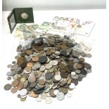 A large collection of world coins to include coins from France, Portugal, Germany, UK and others. To