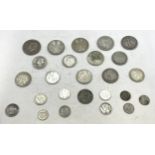 A collection of silver coins to include coins from France, USA, Germany, UK and others. Total weight