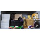 A mixed lot of games, toys, and household items to include baskets, a leather clad Chateau des
