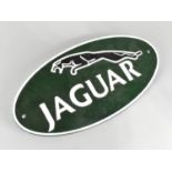 A Reproduction Cold Painted Cast Iron Oval Sign For Jaguar, 35 x 17cms