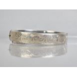 A Georg Jensen Silver Bangle with Hand Engraved Decoration, London 1957, Makers Mark GJ ltd