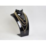 A 9ct Gold Watch Chain, Mixed Fancy Links with Faceted Sphere and Trombone Type Embellishments, with