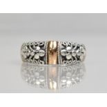 An 18ct Gold Mounted Silver Ring by Suarti with Cannatille and Polished Decoration, Size K.5, 5.