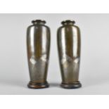 A Pair of Japanese Meiji Period Bronze Vases with Mixed Metal Cast Decoration Depicting Cranes,