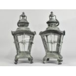 A Pair of New and Unused Green Patinated Lanterns on Scrolled Feet, 37cms High