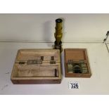 A VINTAGE MAHOGANY CASED BRASS MONOCULAR MICROSCOPE, LENGTH 15.5CM AND A BOX OF SLIDES