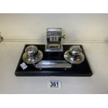 AN ART DECO STERLING SILVER AND EBONISED DESK STAND, BY WILMOT MANUFACTURING CO, BIRMINGHAM 1924,