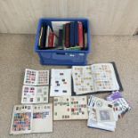 BLUE CRATE OF 12 STAMP ALBUMS AND LOOSE