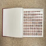 A VINTAGE STAMP ALBUM OF VICTORIAN PENNY REDS AND MORE