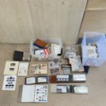 A LARGE BOX OF MIXED STAMP ALBUMS AND LOOSE STAMPS