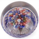 A Baccarat Millefiori mushroom torsade paperweight, circa 1850, with star cut base, diameter 7.5cm