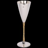 STUART DEVLIN (1931 - 2018) - an Elizabeth II parcel-gilt silver champagne flute, Jubilee hallmark