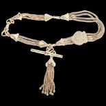 An Antique style gold plated Albertina chain bracelet, with sliding fob, T-bar and tassel pendant,
