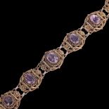 An Antique Austro-Hungarian silver-gilt purple paste and pearl panel bracelet, maker KG, Budapest