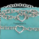 TIFFANY & CO - a heavy sterling silver heart clasp chain necklace and bracelet set, both signed