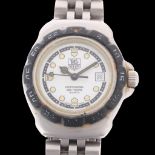 TAG HEUER - a lady's stainless steel Formula 1 Professional 200M quartz calendar bracelet watch,