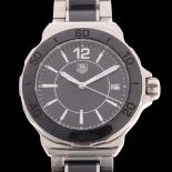 TAG HEUER - a lady's stainless steel and black ceramic Formula 1 quartz calendar bracelet watch,