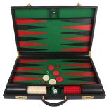 A Smythson of Bond Street backgammon set in black leather case, case (closed) 57cm x 36cm,